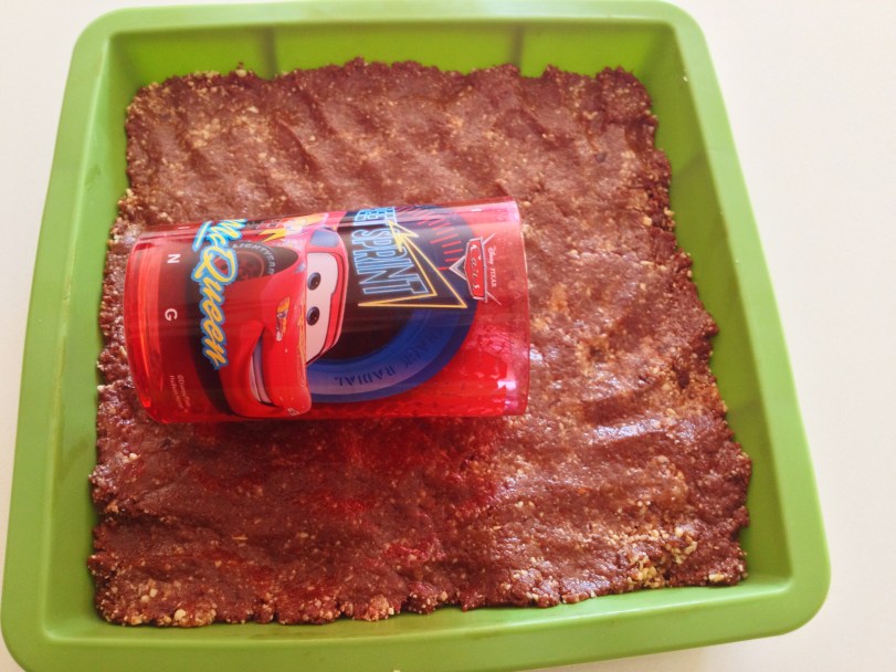 Roll a cup over the mixture to smooth it out