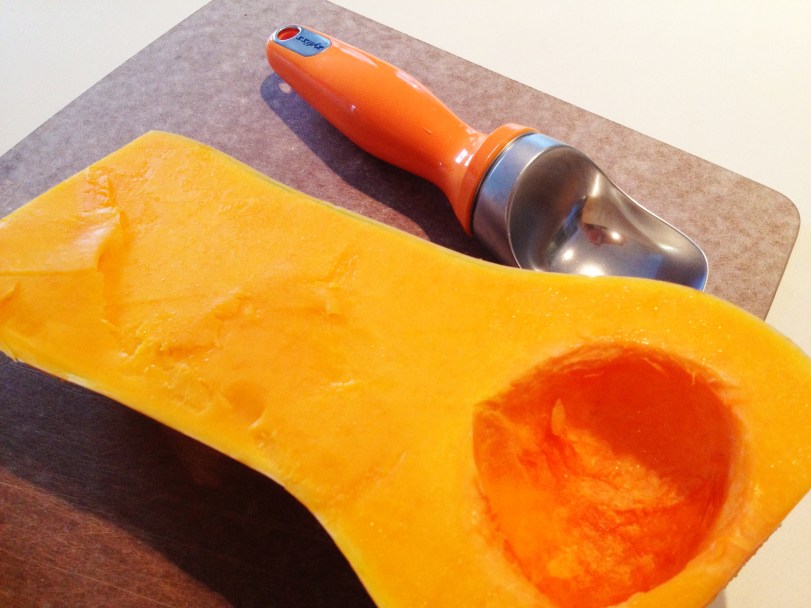 Use your icecream scoop to scoop out those seeds and that flesh.  It's a snap!!