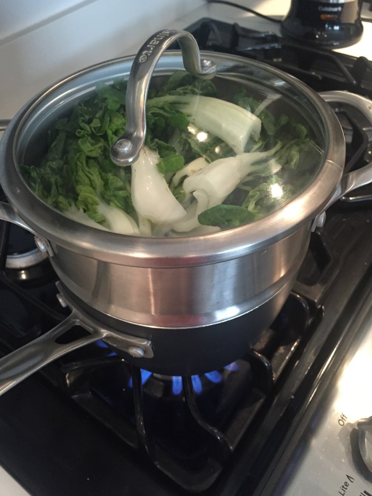 Steam for a minute or so until the leaves are bright green